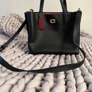 Traditional Black Coach handbag